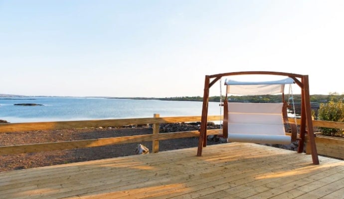 photo of swing with view on the deck